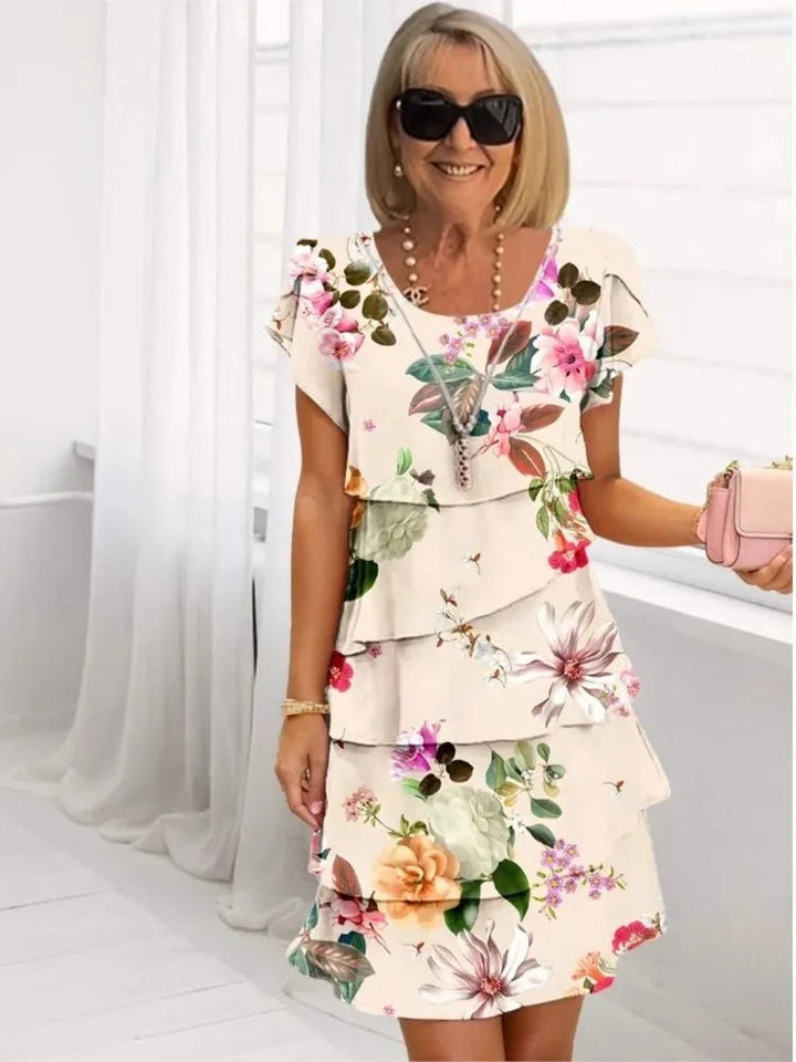 Camille | Robe blanche fluide et élégante à volants - North & Co. Canada