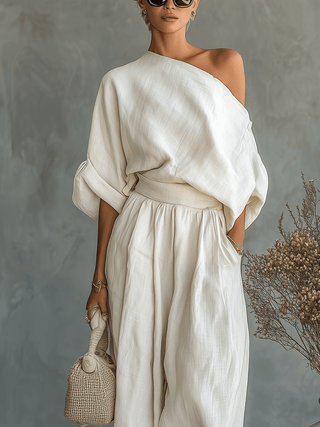 Ensemble en lin blanc cassé pour femme avec haut à épaules dénudées et pantalon fuselé • S1 - North & Co. Canada